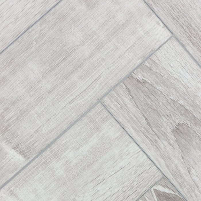 Напольное покрытие виниловый паркет в стиле Herringbone.